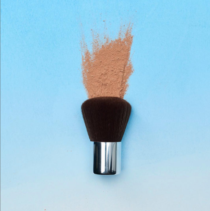 Fond de teint pressé finition naturelle SPF 20 Tan Naturel